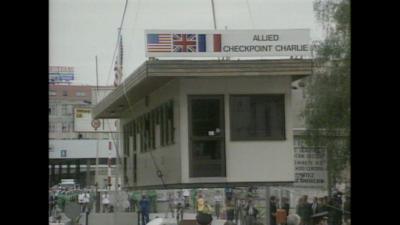 Checkpoint Charlie is lifted by crane.