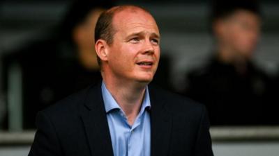 Communities Minister Gordon Lyons