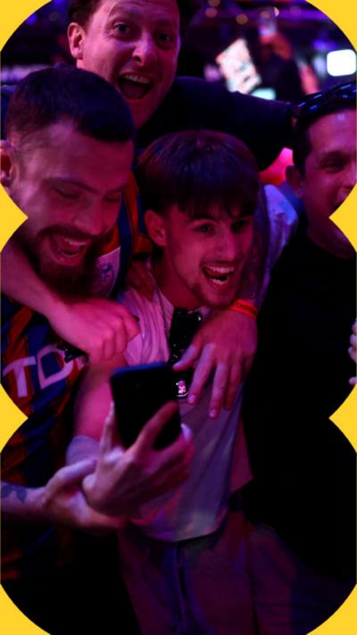 Crystal Palace fans celebrating.