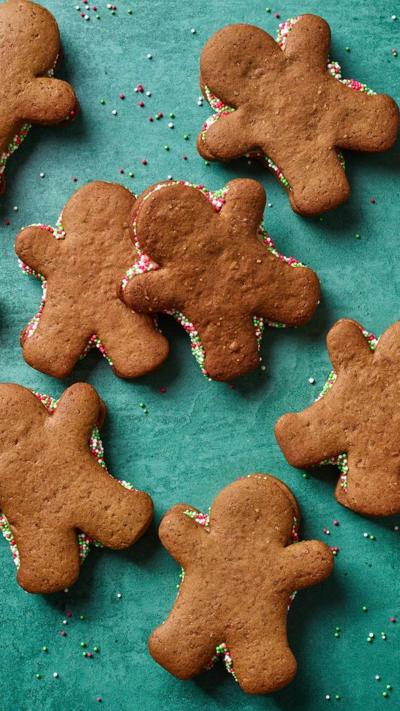 Seven person-shaped gingerbread biscuits 