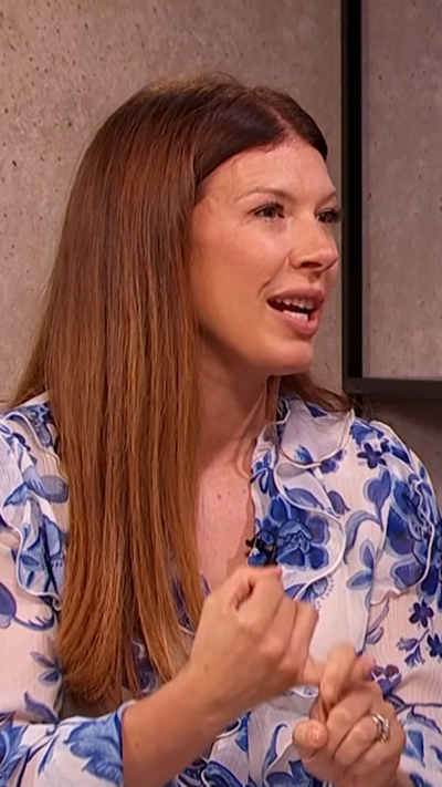 Finance expert Laura Pomfret in the Morning Live studio wearing a blue and white floral dress