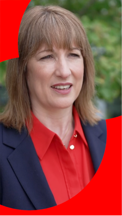 Rachel Reeves with a red shirt on looking at a camera 