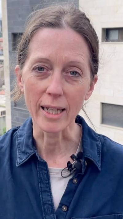 Lucy Williamson in a blue shirt in Haifa