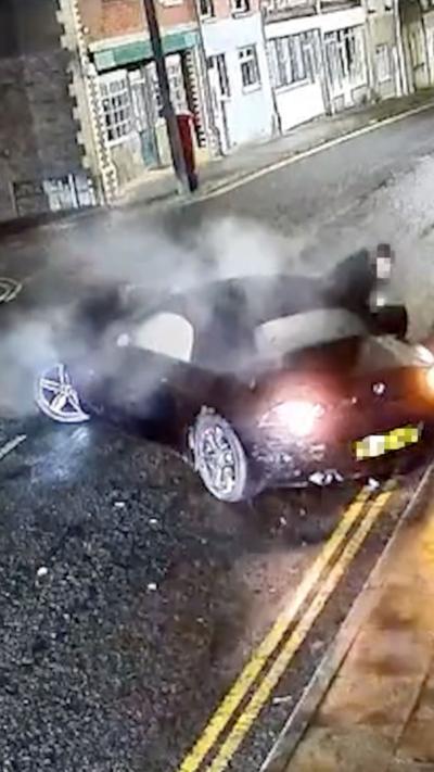 An image of a crashed car