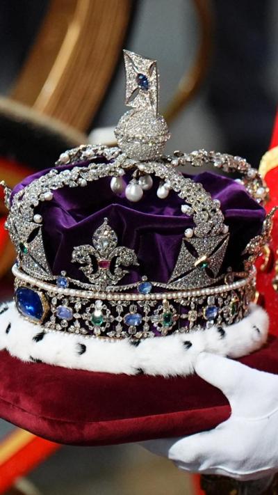 King's crown on a red pillow