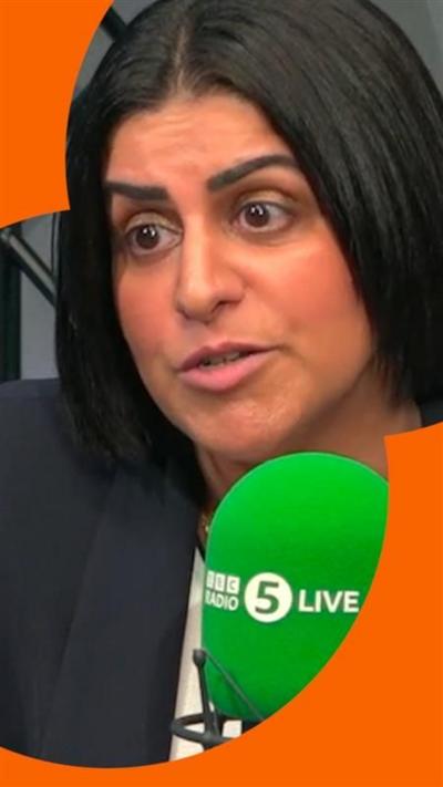 A woman, Shabana Mahmood, in a suit jacket sits in front of a green 5Live branded mic