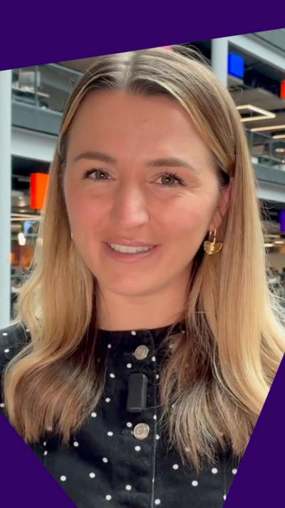 BBC's Lucy Woodham smiles to the camera from the BBC newsroom.