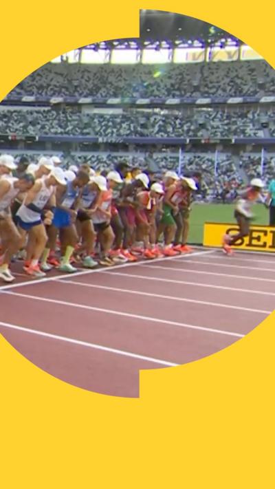 Marathon runners being stopped on the track after a false start
