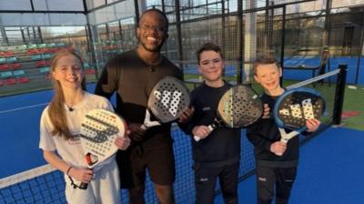 De-Graft and kids holding padel bats