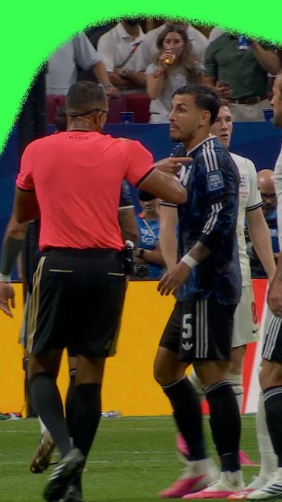 Leandro Paredes speaks to the referee