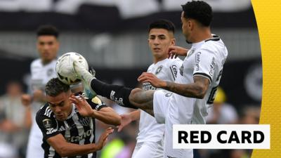 Botafogo's Gregore is sent sent off for a high-foot challenge on Atletico Mineiro's Fausto Vera