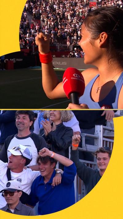 Emma Raducanu looks towards fans who are smiling with raised hands 