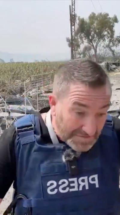 Men wearing press protective vest