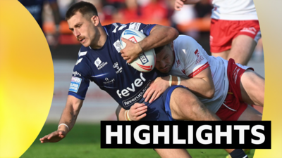 Toulouse's Luke Polselli is tackled by Hull KR's James Batchelor