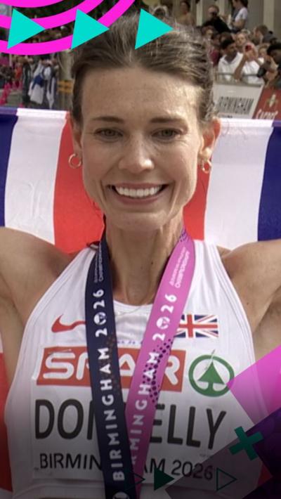 Abbie Donnelly of Great Britain with medal around her neck 