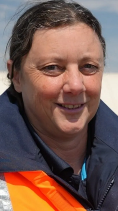 Woman looks at camera