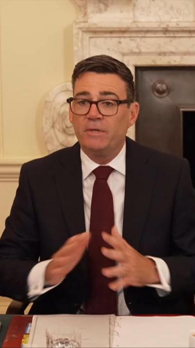 Andy Burnham speaking at his cabinet table