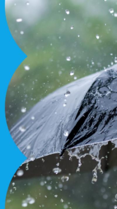 Rain falling on an umbrella