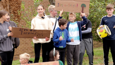 The children staged a peaceful protest by the rope-swing