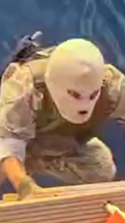 Man in balaclava boards ship 