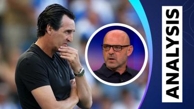 Aston Villa manager Unai Emery looks concerned on the sideline while Danny Murphy talks