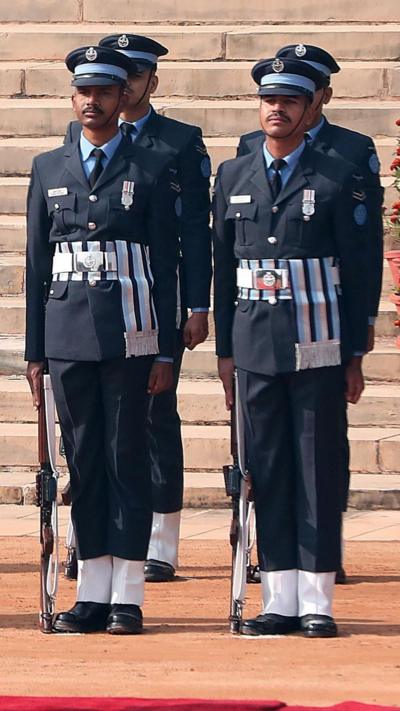 Armed guards stand to attention