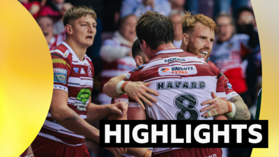 Wigan celebrate a try against St Helens