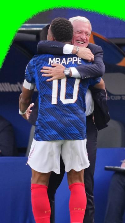 Kylian Mbappe hugging Didier Deschamps