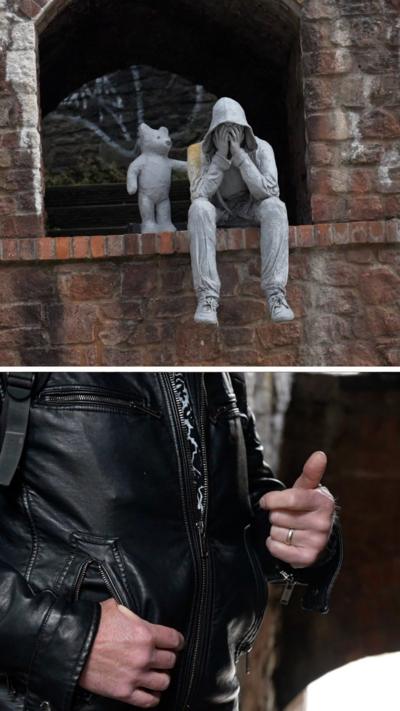 Composite image of a statue of a man next to a bear, and an anonymised man's hands.