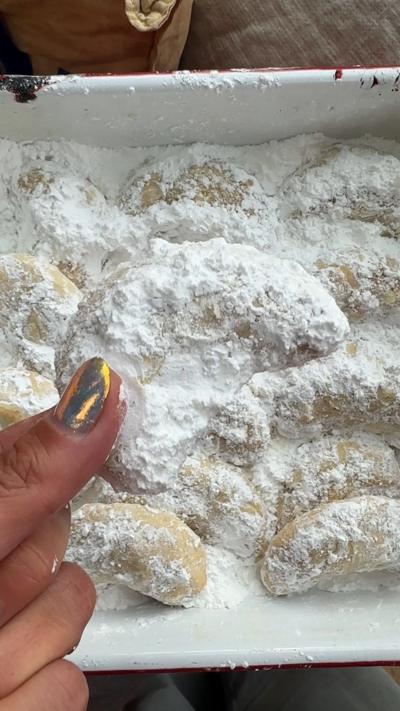 Flour covered dough in a white dish