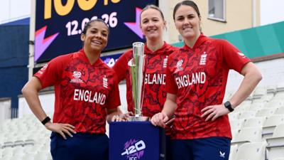 Sophia Dunkley, Lauren Filer and Nat Scriver-Brunt pose with the women's T20 World Cup trophy
