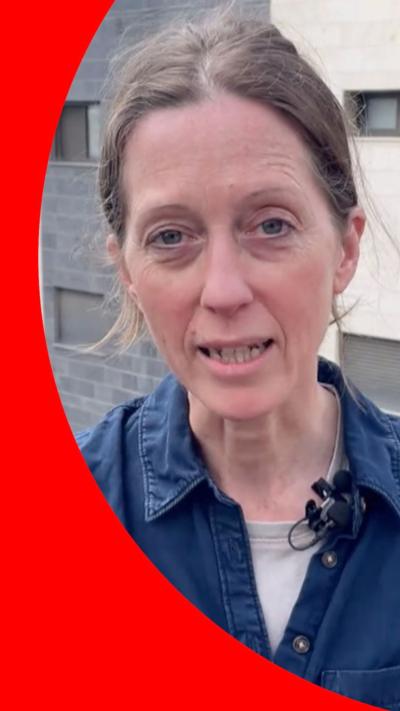 Lucy Williamson in a blue shirt