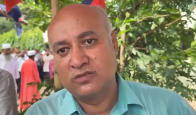 A man in a green t-shirt 