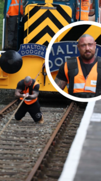 Man pulls train