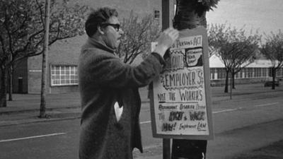 Walter Morrison protests losing his job at a print factory in Glasgow