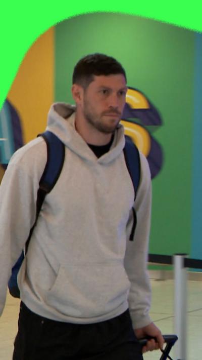Scotland's Scott McKenna arrives at Glasgow Airport