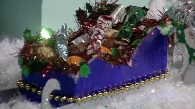 Christmas sledge decoration full of sweets