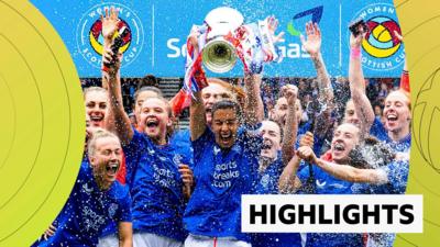 Rangers players lift trophy 