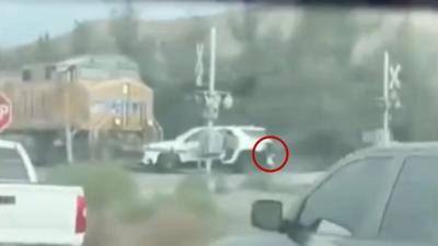 Woman runs to save her kid from an oncoming train