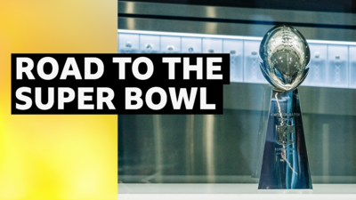 Graphic saying 'road to the Super Bowl' beside an image of the Vince Lombardi Trophy