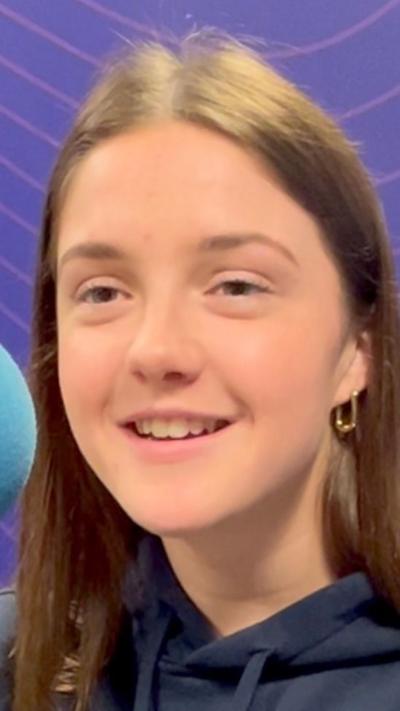 Jo Tuckett smiling to the left.