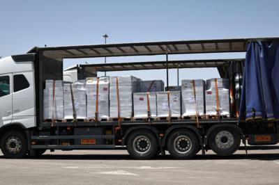 A truck carrying aid waits to enter the Gaza Strip at the Kerem Shalom crossing, southern Israel