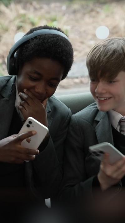 Schoolchildren on their mobile phones