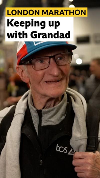 81-year-old Grandad smiles to camera and wears a cap and glasses in his interview with BBC Sport