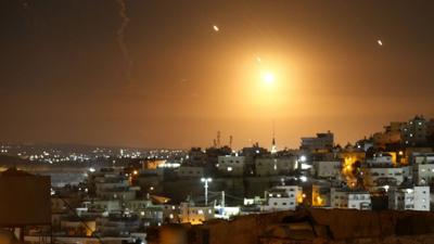 Many rockets, fired from Iran, are seen over Jerusalem from Hebron, West Bank on October 01, 2024. 