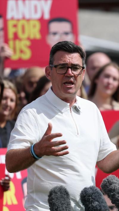 Andy Burnham giving a speech to supporters 