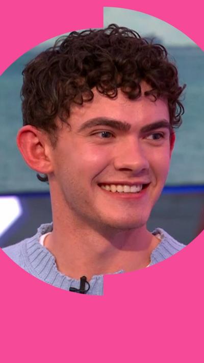 Screengrab of Locke smiling while on the One Show