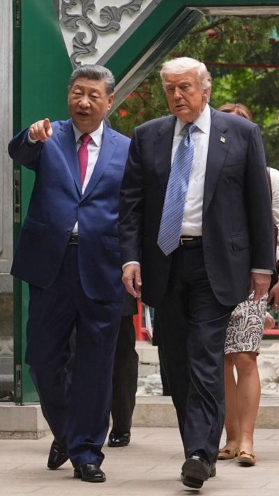 Trump and Xi talking and walking in Zhongnanhai garden