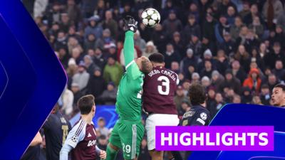 Aston Villa's Diego Carlos challenges Juventus keeper Michele Di Gregorio