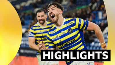 Warrington's Matty Ashton celebrates scoring a try against Huddersfield